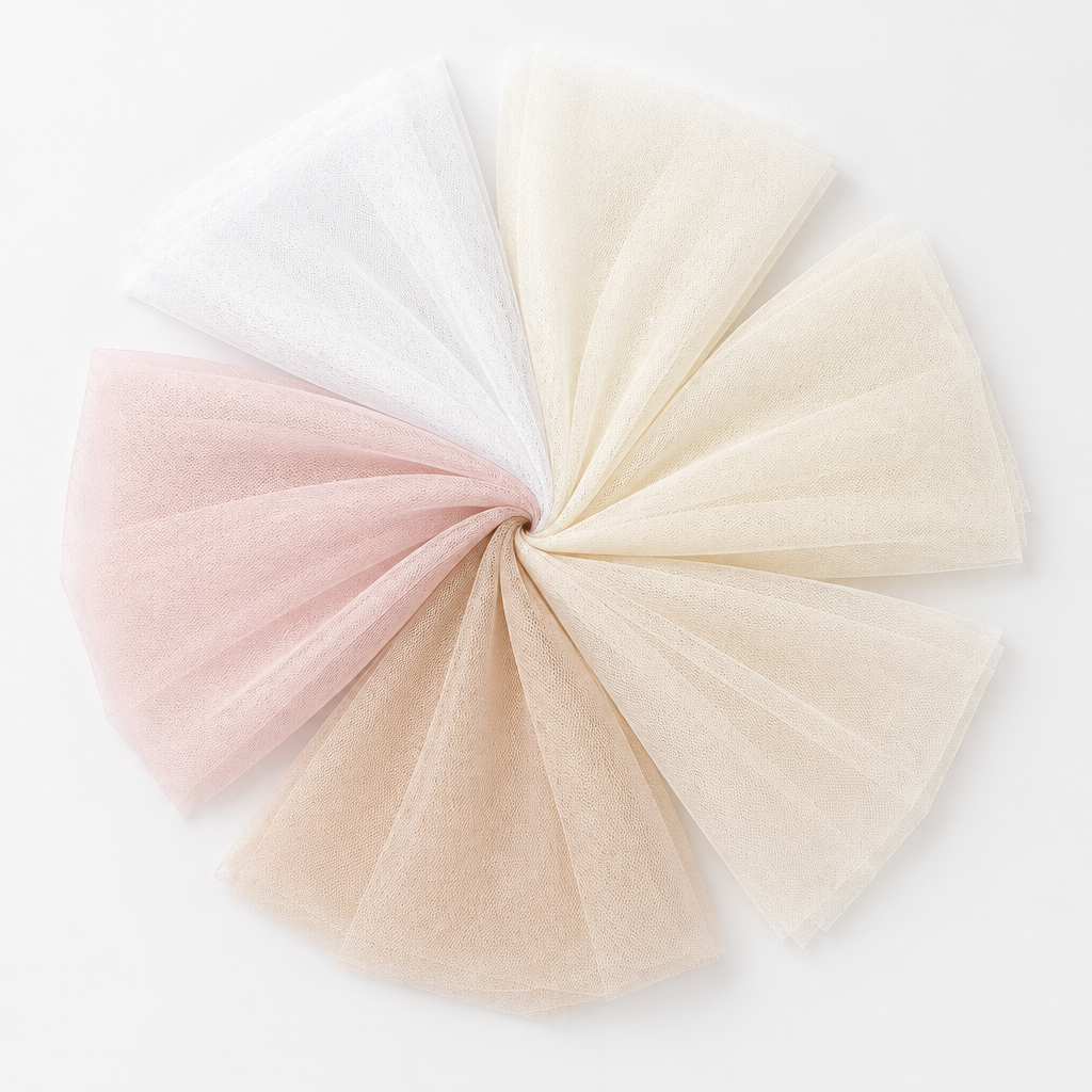 Six bridal veiling tulle swatches in white, off white, ivory, light ivory, champagne, and blush pink, without words